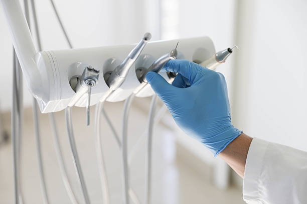 Professional Invisalign Clear Aligners technician working in Clio, MI
